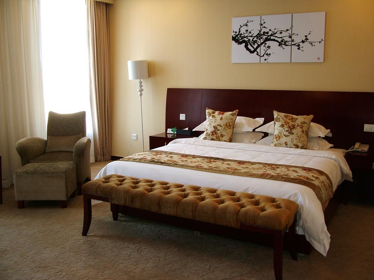 Fuxing Oriental Boutique Hotel Chifeng Zimmer foto