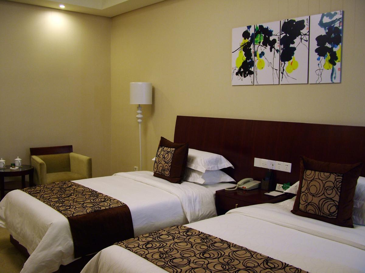 Fuxing Oriental Boutique Hotel Chifeng Zimmer foto