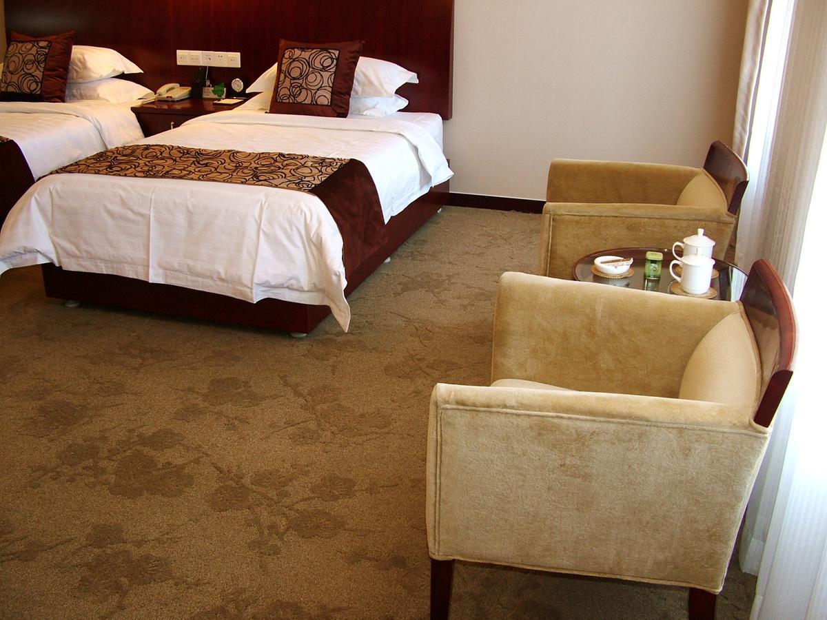 Fuxing Oriental Boutique Hotel Chifeng Zimmer foto